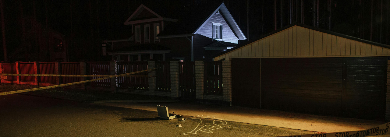 night crime scene outside house